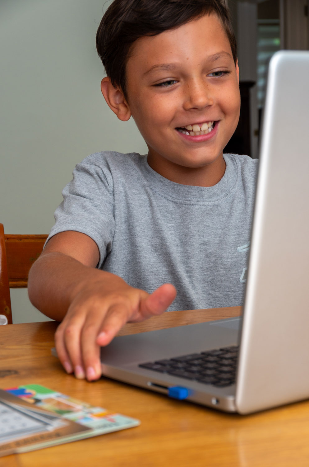 Student during an individual tuition session working at a computer